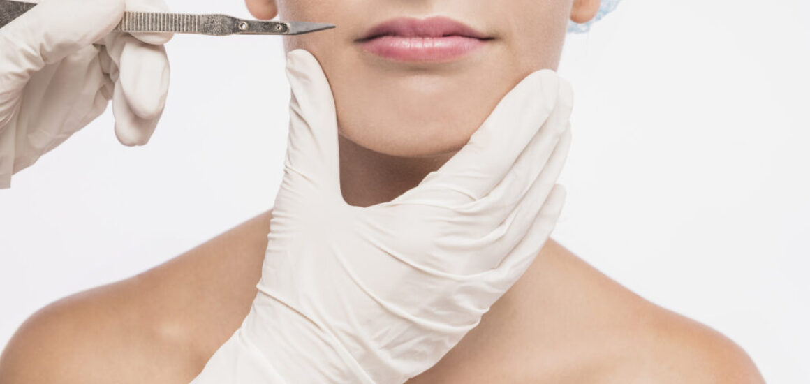 doctor-holding-scalpel-near-woman-lips-1