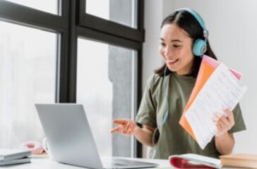 woman-with-headphones-having-video-call-laptop