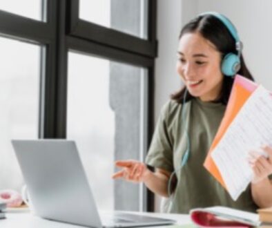 woman-with-headphones-having-video-call-laptop